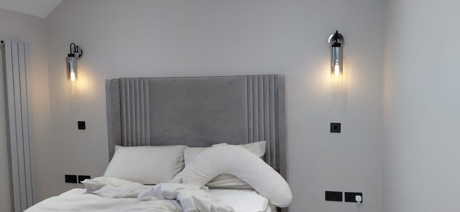 Bedroom with a pair of wall lights fitted either side of the bed by Z Electricals