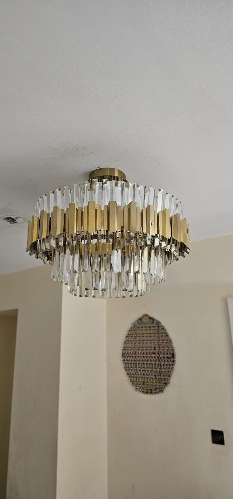 Gold and crystal chandelier installed by Z Electricals