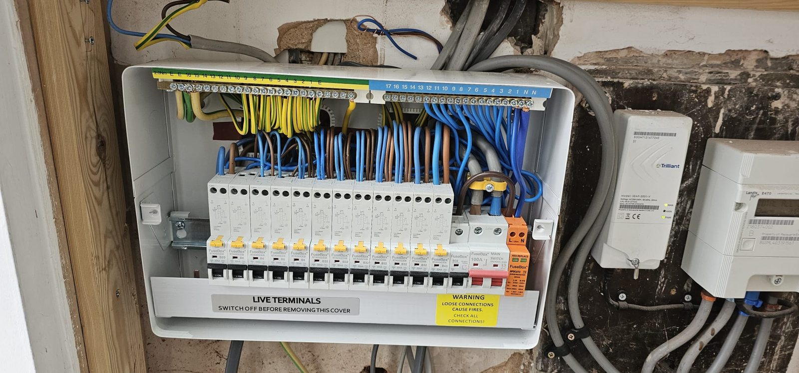 Inside of a consumer unit showing tidy professional wiring by Z Electricals