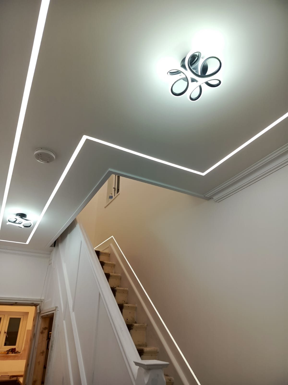 Staircase with recessed LED strip lighting installed by Z Electricals
